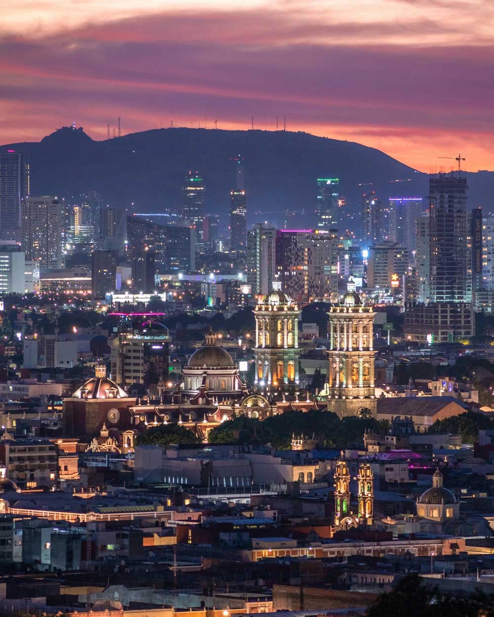 vista de la ciudad de puebla completa por el atardecer